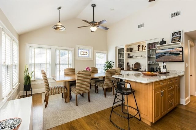 15 Yantecaw Ave, Bloomfield Twp, NJ 07003 - dining area with a ceiling fan, dark wood-type flooring, and high vaulted ceiling