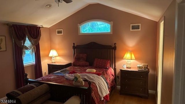 269 E Shore Trl, Sparta Twp, NJ 07871 - bedroom featuring wood finished floors, lofted ceiling, and baseboards