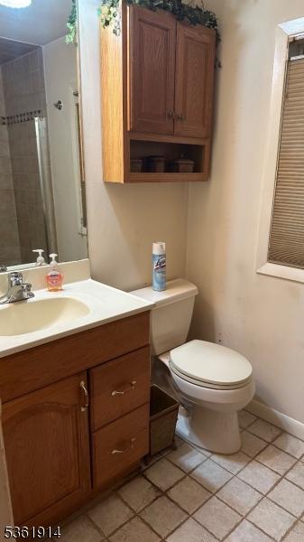 269 E Shore Trl, Sparta Twp, NJ 07871 - full bathroom with toilet, vanity, and tile patterned flooring