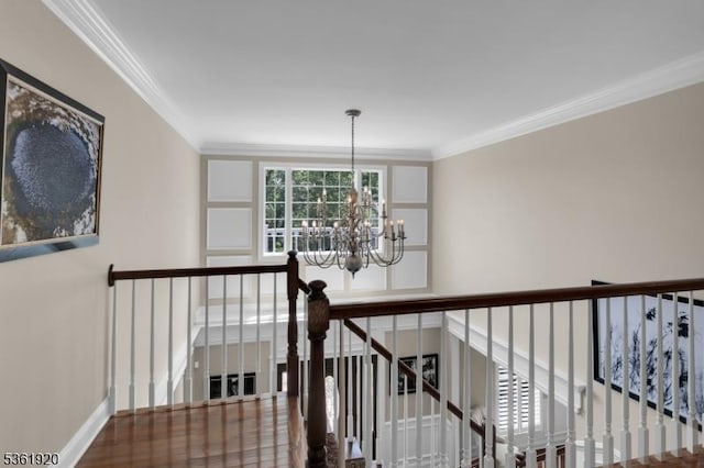 52 Independence Dr, Bernards Twp, NJ 07920 - hall featuring an upstairs landing, a chandelier, crown molding, and baseboards