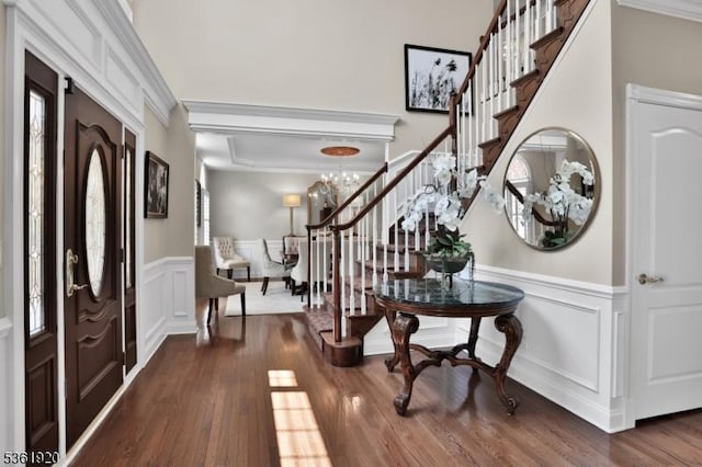 52 Independence Dr, Bernards Twp, NJ 07920 - foyer featuring stairway, a wainscoted wall, a chandelier, ornamental molding, and dark wood finished floors