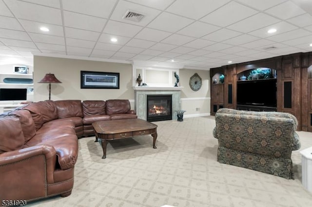 52 Independence Dr, Bernards Twp, NJ 07920 - carpeted living area with a glass covered fireplace, recessed lighting, and a paneled ceiling