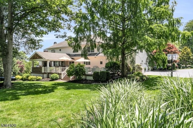 52 Independence Dr, Bernards Twp, NJ 07920 - rear view of property featuring a yard and a wooden deck