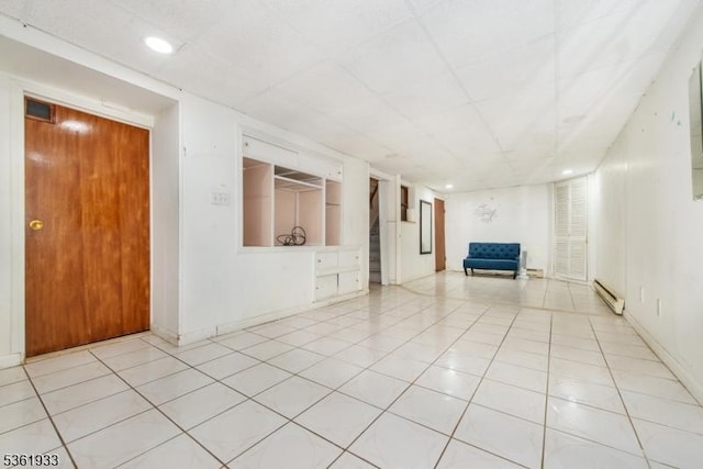 30 Filbert Ln, Union Twp, NJ 07083 - empty room featuring baseboard heating, stairway, light tile patterned flooring, and recessed lighting