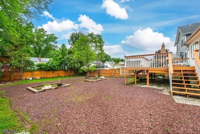 30 Filbert Ln, Union Twp, NJ 07083 - fenced backyard featuring a garden, stairway, and a deck