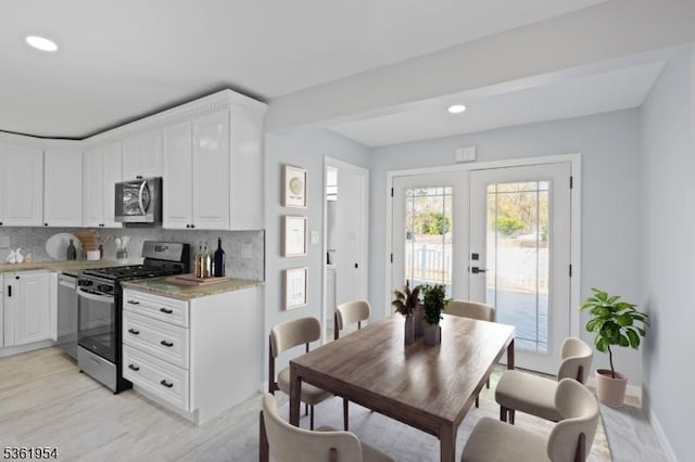 6 Lionel Pl, Hanover Twp, NJ 07981 - kitchen featuring stainless steel appliances, backsplash, white cabinetry, french doors, and recessed lighting