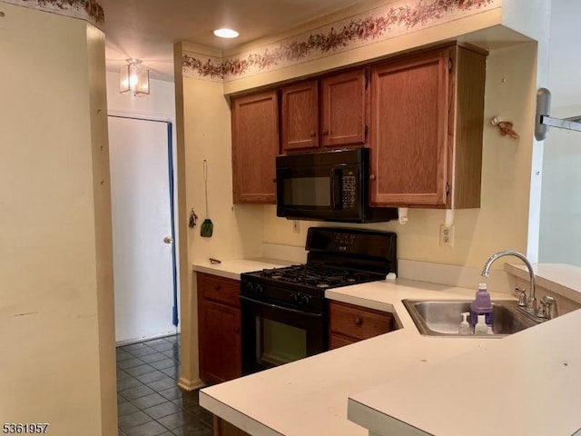 55 Weatherhill Rd, Hamburg Boro, NJ 07419 - kitchen with black appliances, a sink, a peninsula, light countertops, and recessed lighting