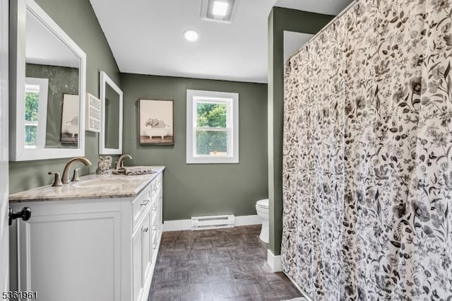172 Ferry Rd, Delaware Twp, NJ 08822 - full bath featuring double vanity, a baseboard radiator, plenty of natural light, and a shower with shower curtain
