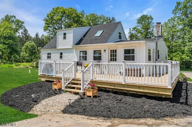 172 Ferry Rd, Delaware Twp, NJ 08822 - rear view of house featuring a shingled roof, a deck, a lawn, and a chimney