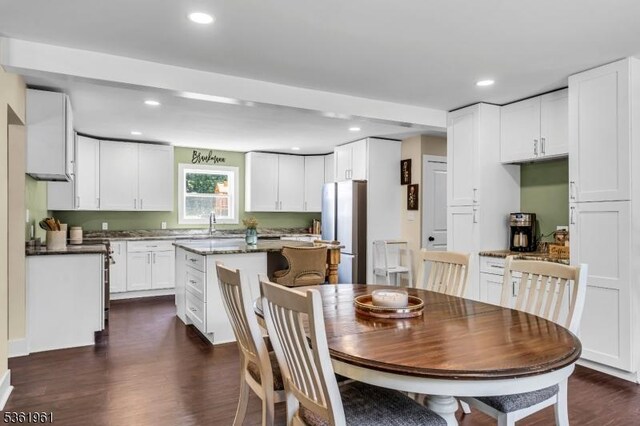 172 Ferry Rd, Delaware Twp, NJ 08822 - dining room featuring dark wood-style flooring and recessed lighting