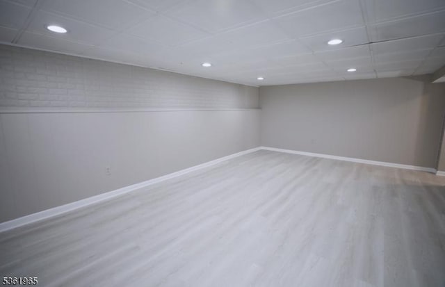 914 Merritt Dr Unit E, Hillsborough Twp, NJ 08844 - finished below grade area with wood finished floors, baseboards, and recessed lighting