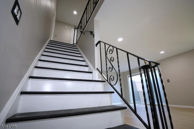 914 Merritt Dr Unit E, Hillsborough Twp, NJ 08844 - stairway featuring baseboards, wood finished floors, and recessed lighting