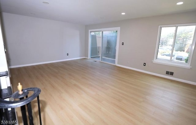 914 Merritt Dr Unit E, Hillsborough Twp, NJ 08844 - unfurnished living room featuring baseboards, light wood-type flooring, and recessed lighting