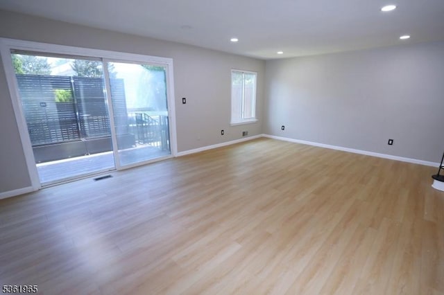 914 Merritt Dr Unit E, Hillsborough Twp, NJ 08844 - spare room featuring baseboards, recessed lighting, and light wood-style flooring