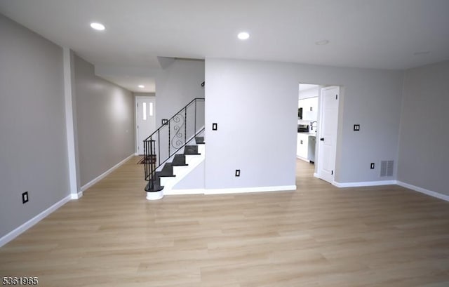 914 Merritt Dr Unit E, Hillsborough Twp, NJ 08844 - empty room featuring light wood-style flooring, stairway, baseboards, and recessed lighting