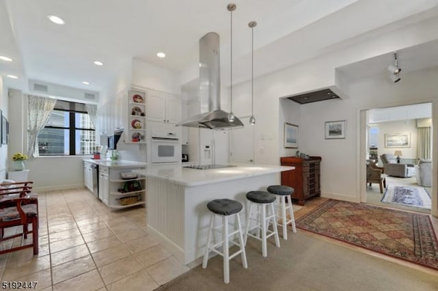 111 Mulberry St Unit Sky, Newark City, NJ 07102 - kitchen with open shelves, island exhaust hood, oven, black electric cooktop, and white cabinetry