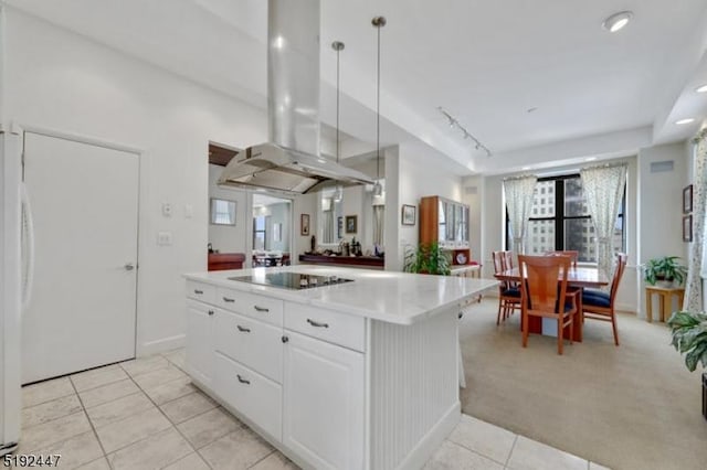 111 Mulberry St Unit Sky, Newark City, NJ 07102 - kitchen featuring black electric stovetop, island range hood, plenty of natural light, light tile patterned floors, and recessed lighting