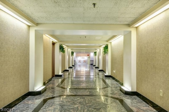 111 Mulberry St Unit Sky, Newark City, NJ 07102 - hall featuring marble tiled flooring and baseboards