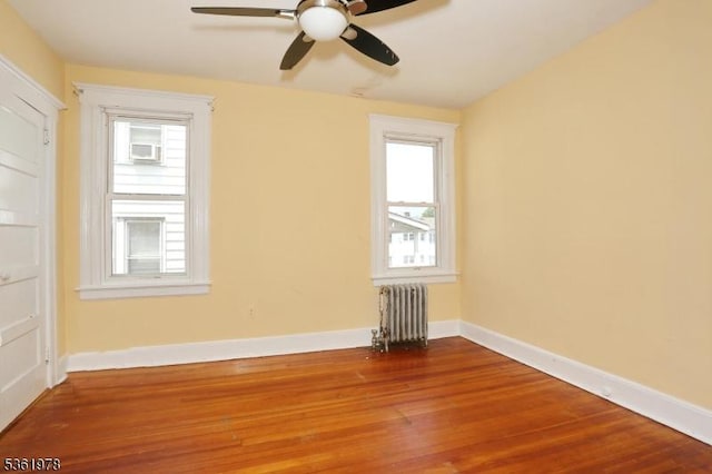267 Hoover Ave, Bloomfield Twp, NJ 07003 - empty room featuring radiator heating unit, wood finished floors, ceiling fan, and baseboards