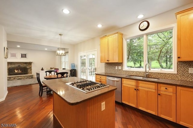 7 Watchung Dr, Bernards Twp, NJ 07920 - kitchen with appliances with stainless steel finishes, a sink, dark wood-style floors, tasteful backsplash, and plenty of natural light