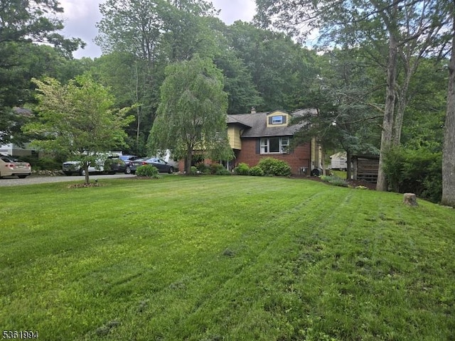 38 Weldon Rd, Jefferson Twp, NJ 07849 - view of front of house featuring a front lawn