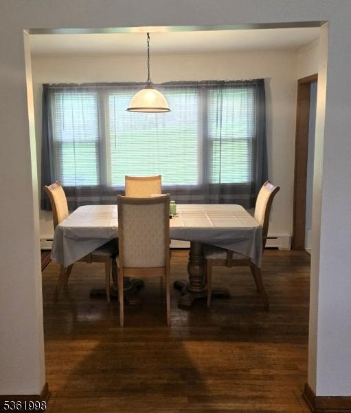 355 State Route 94, Fredon Twp, NJ 07860 - dining area with wood finished floors and a baseboard heating unit