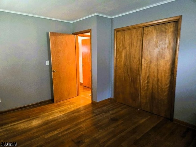 355 State Route 94, Fredon Twp, NJ 07860 - unfurnished bedroom with wood finished floors, ornamental molding, and a closet