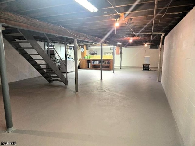 355 State Route 94, Fredon Twp, NJ 07860 - unfinished below grade area with stairway, washer / clothes dryer, and concrete block wall