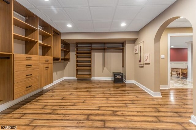 2 Moore Dr, Raritan Twp, NJ 08822 - walk in closet with wood finished floors and arched walkways