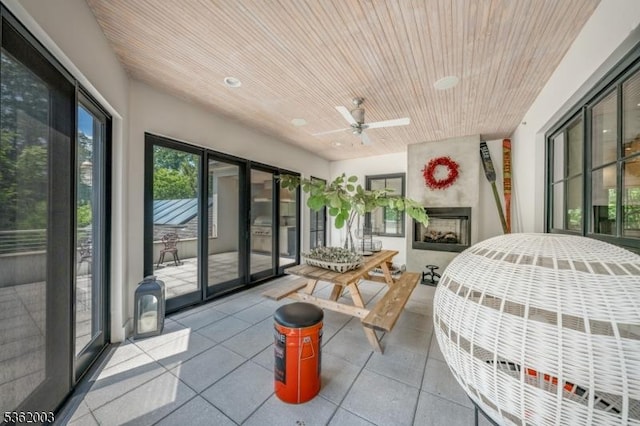 60 Fernwood Rd, Summit City, NJ 07901 - sunroom / solarium featuring a ceiling fan and a fireplace