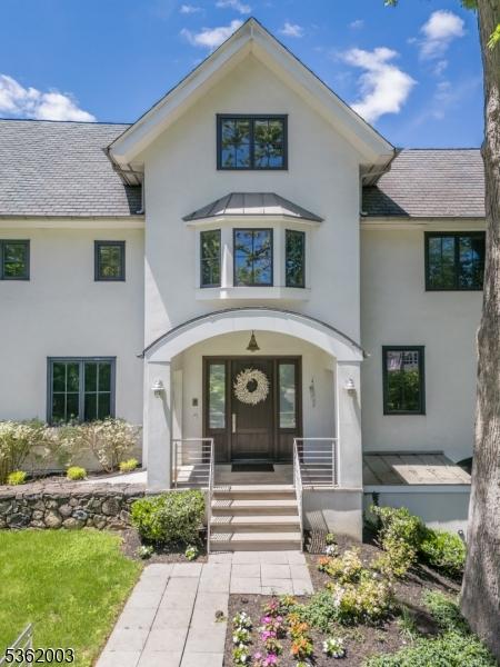 60 Fernwood Rd, Summit City, NJ 07901 - entrance to property featuring stucco siding, a shingled roof, and a porch