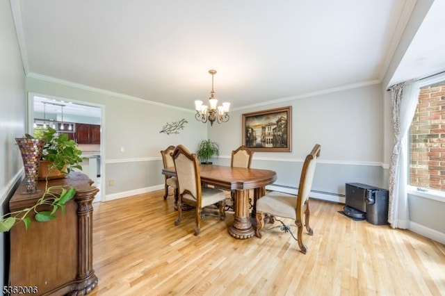 5 Mariner Dr, Randolph Twp, NJ 07869 - dining area featuring a chandelier, light wood-style floors, baseboards, and ornamental molding