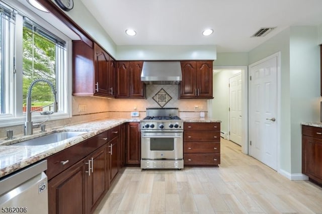 5 Mariner Dr, Randolph Twp, NJ 07869 - kitchen featuring wall chimney range hood, stainless steel appliances, a sink, backsplash, and light stone countertops