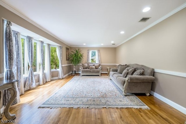 5 Mariner Dr, Randolph Twp, NJ 07869 - living area with baseboards, wood finished floors, recessed lighting, and crown molding