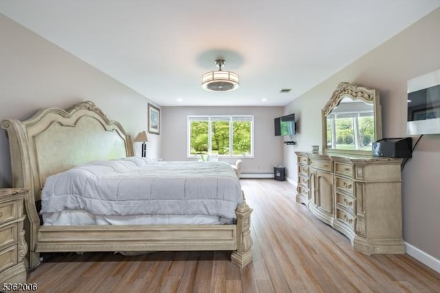 5 Mariner Dr, Randolph Twp, NJ 07869 - bedroom featuring baseboard heating, light wood finished floors, multiple windows, and baseboards