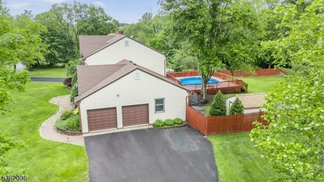 5 Mariner Dr, Randolph Twp, NJ 07869 - view of property exterior with driveway and a garage