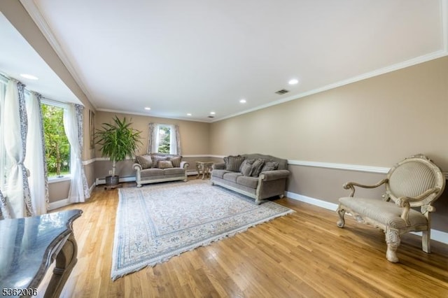 5 Mariner Dr, Randolph Twp, NJ 07869 - living area with healthy amount of natural light, baseboards, light wood finished floors, ornamental molding, and recessed lighting