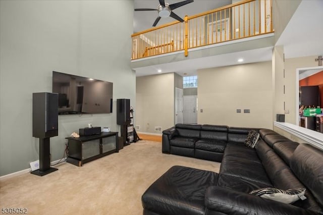 14 Barn Swallow Ct, Greenwich Twp, NJ 08886 - living area featuring carpet floors, a ceiling fan, a towering ceiling, and baseboards