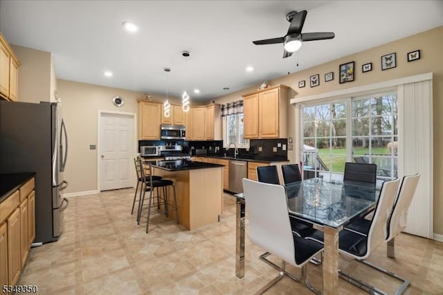 14 Barn Swallow Ct, Greenwich Twp, NJ 08886 - kitchen featuring appliances with stainless steel finishes, light brown cabinets, a sink, a center island, and recessed lighting