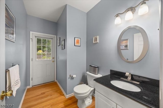 14 Barn Swallow Ct, Greenwich Twp, NJ 08886 - bathroom with vanity, wood finished floors, toilet, and baseboards