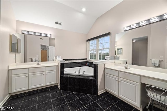 14 Barn Swallow Ct, Greenwich Twp, NJ 08886 - full bath with tile patterned floors, two vanities, a garden tub, and high vaulted ceiling