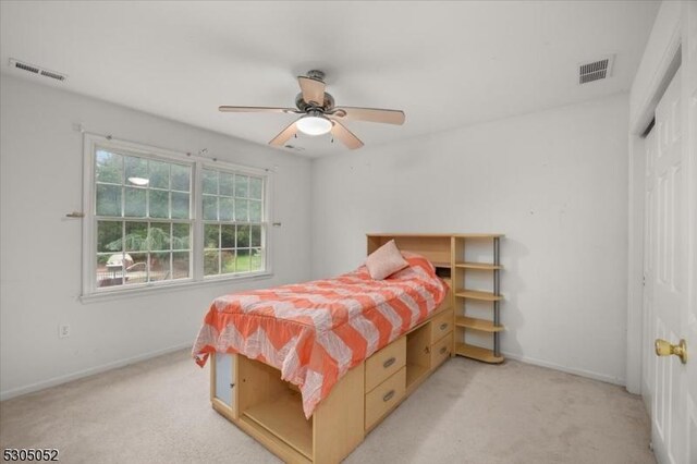 14 Barn Swallow Ct, Greenwich Twp, NJ 08886 - bedroom with baseboards, light colored carpet, a closet, and a ceiling fan