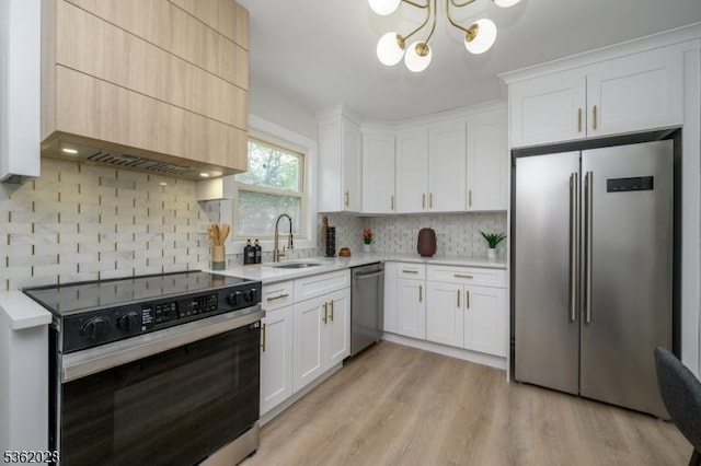 144 Elm St, Rockaway Twp, NJ 07801 - kitchen with appliances with stainless steel finishes, light countertops, a sink, and decorative backsplash