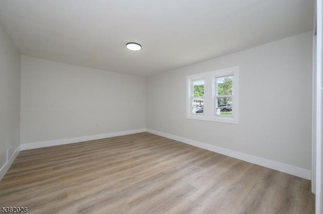 144 Elm St, Rockaway Twp, NJ 07801 - empty room with baseboards and light wood-style floors