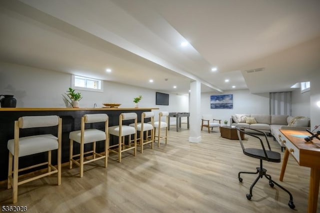 144 Elm St, Rockaway Twp, NJ 07801 - interior space with light wood-style floors, recessed lighting, bar, and baseboards