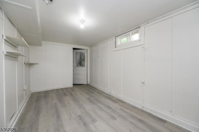 144 Elm St, Rockaway Twp, NJ 07801 - below grade area featuring a decorative wall and light wood-type flooring