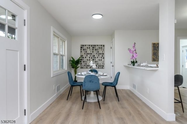 144 Elm St, Rockaway Twp, NJ 07801 - dining area featuring wood finished floors and baseboards