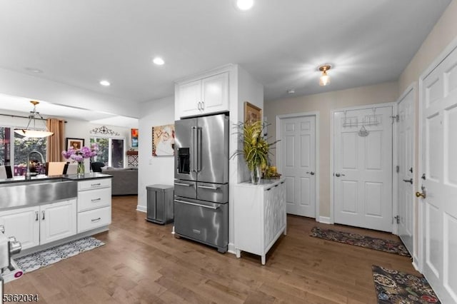 18 Inverrary Pl, Clinton Twp, NJ 08801 - kitchen featuring high end fridge, a sink, white cabinets, light wood-style flooring, and recessed lighting