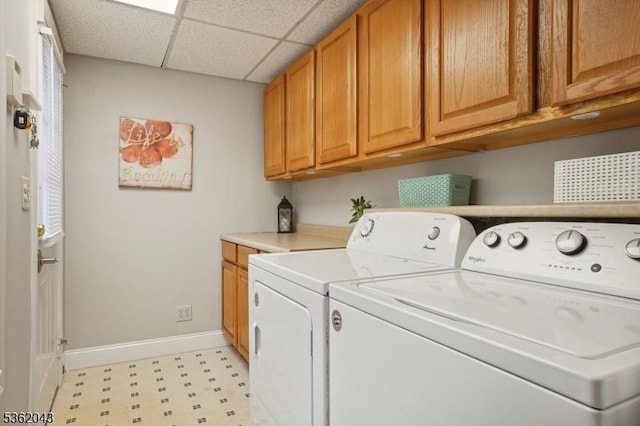 67 Parsippany Rd, Hanover Twp, NJ 07981 - laundry area featuring light floors, washer and dryer, baseboards, and cabinet space