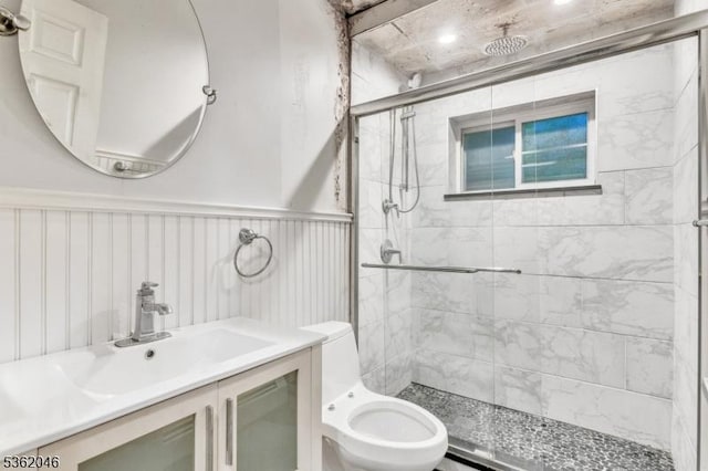 2200 Paterson Plank Rd Unit 23, North Bergen Twp, NJ 07047 - full bath with a shower stall, toilet, vanity, and a wainscoted wall